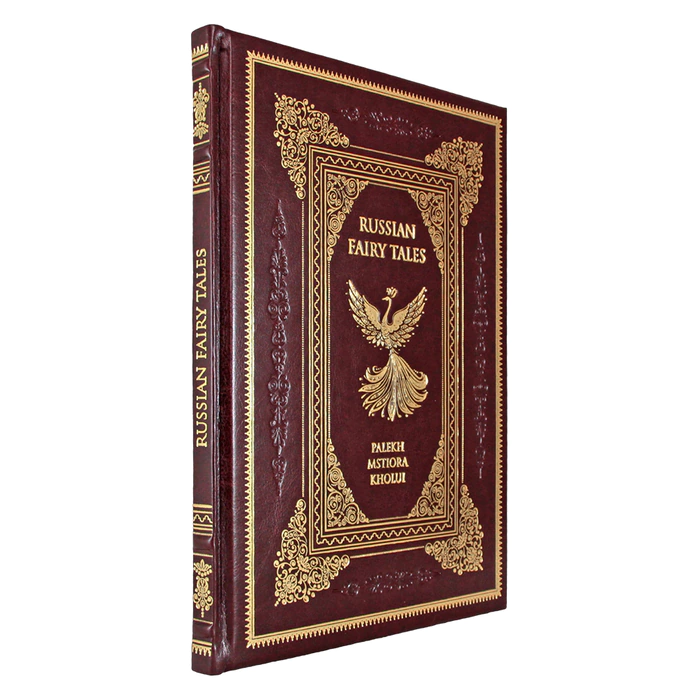 The leather-bound book "Russian folk tales. Palekh, mstera, lackey" in English